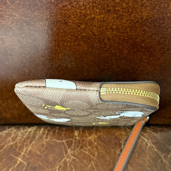 Coach x Peanuts Snoopy and Woodstock Brown Wristlet - Picture 6 of 9
